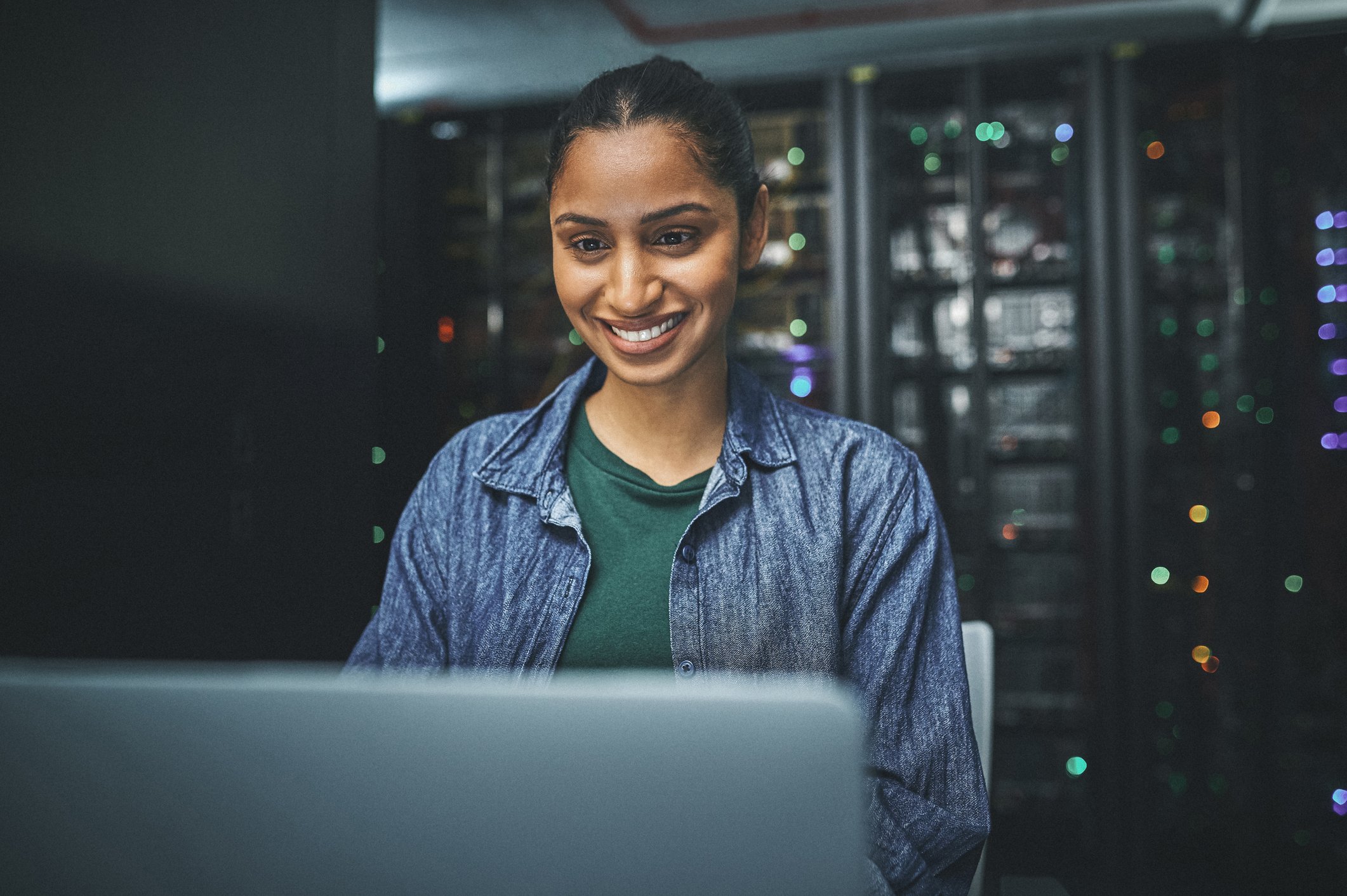 female IT technician in a server room