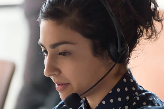 Woman-with-Headset-700×467