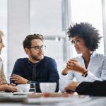 Shot of a group of businesspeople sitting together in a meeting